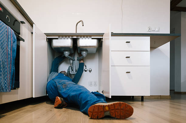 Professional Drain Cleaning technician working in Louisburg, NC